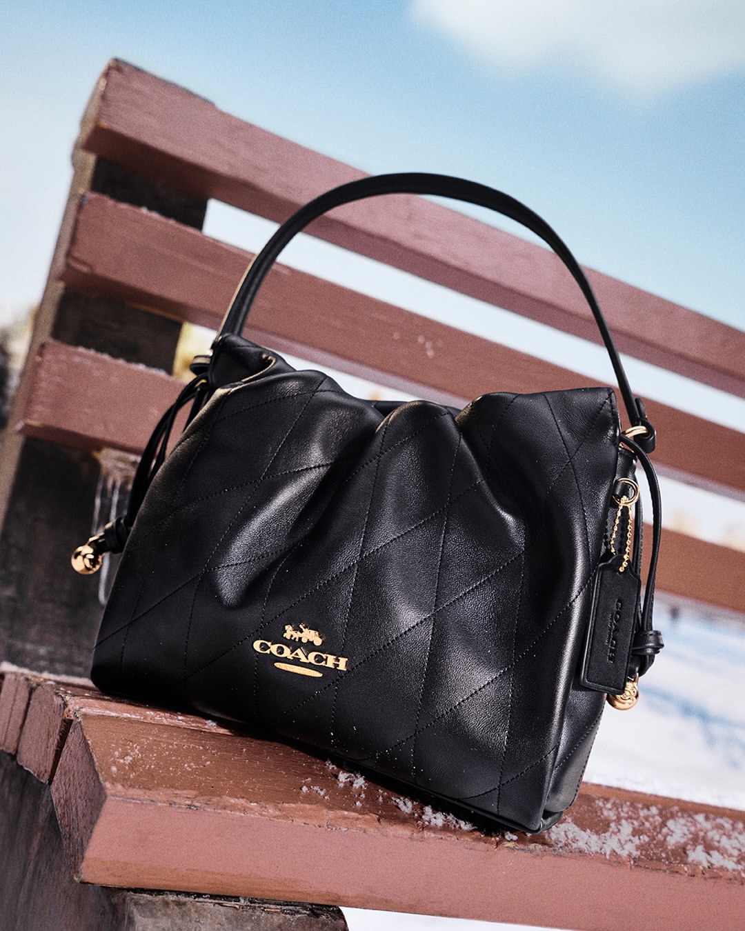 SOYEON for Coach, in a snowfall crafted for the fr...