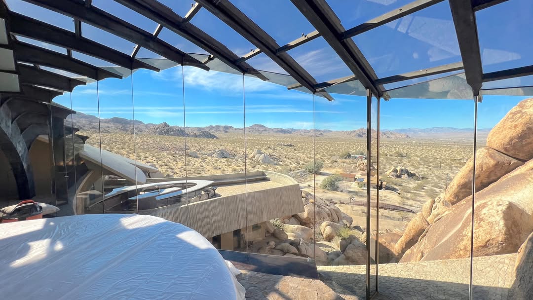 High Desert architecture surrounded by boulders wa...