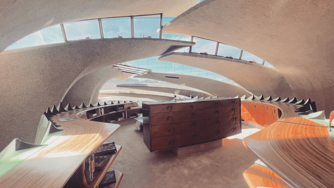 High Desert architecture surrounded by boulders wa...